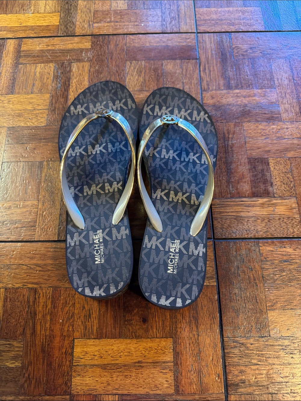 Michael Kors Black and Gold MK Logo Flip Flops